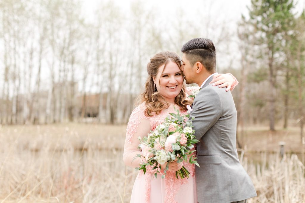 Bride, groom, bridal party, wedding ceremony, wedding venue, wedding photos, wedding inspo, the kiss, spring wedding, summer wedding, minnesota wedding photographer, mn wedding, mn wedding venue, details, lindsey white photography, color palette inspiration, Floral arrangement, floral bouquet, poses, st paul wedding, pink wedding dress, k and j catering