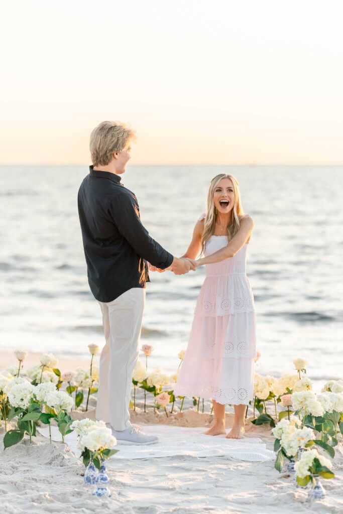 woman surprised by engagement proposal taken by photographer in naples