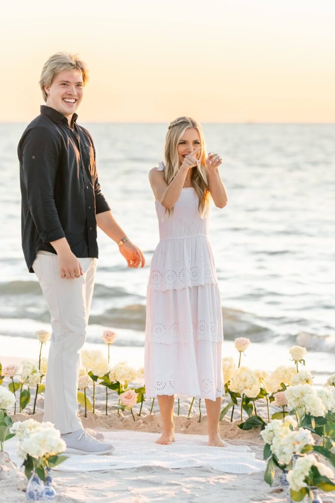 woman surprised by engagement proposal taken by photographer in naples