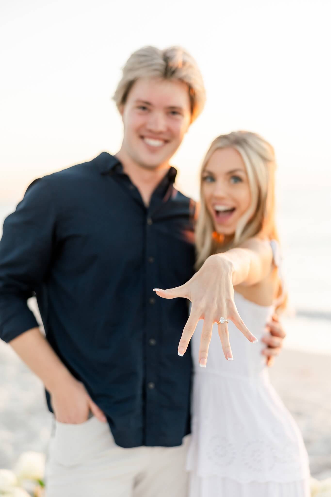 recently engaged couple beach proposal by photographers naples fl