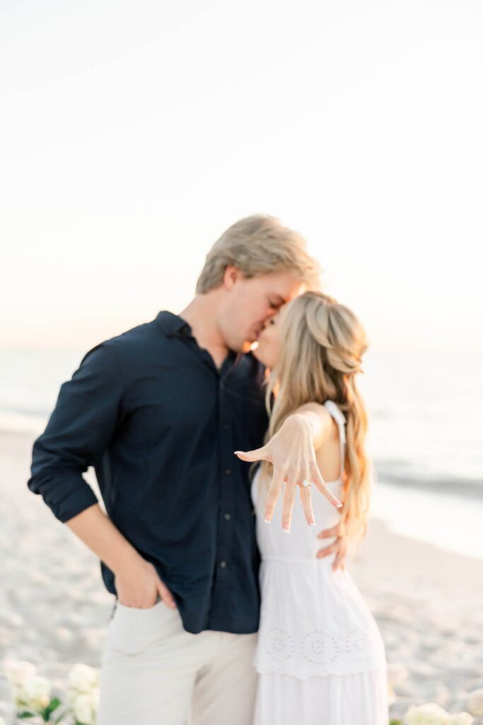 recently engaged couple beach proposal by photographers naples fl