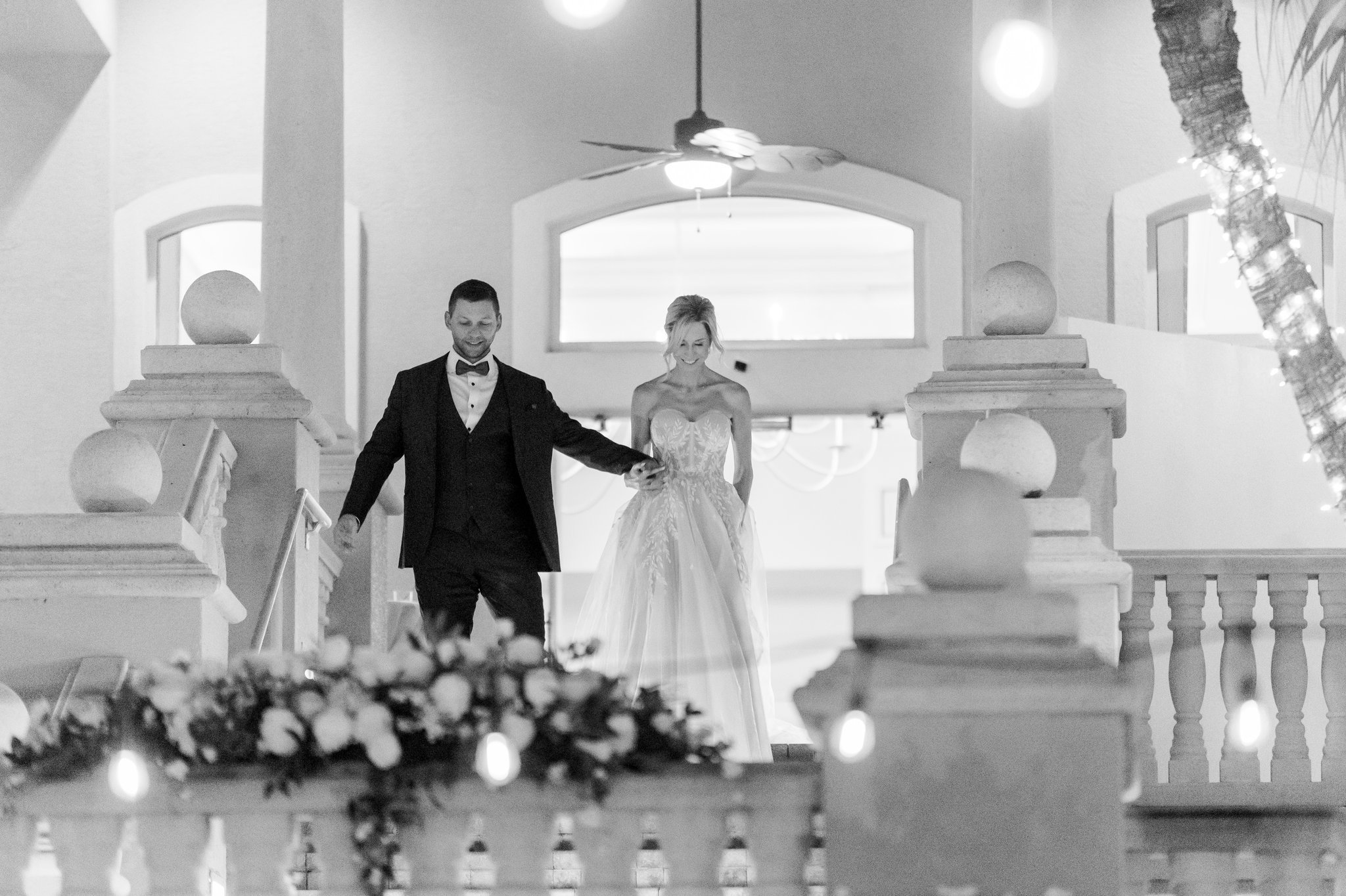 bride and groom at the club at the strand wedding venue