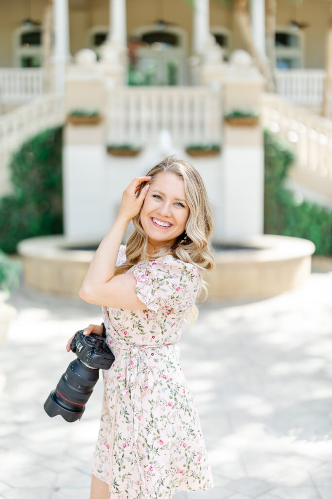 Lindsey White posing to show being a wedding photographer