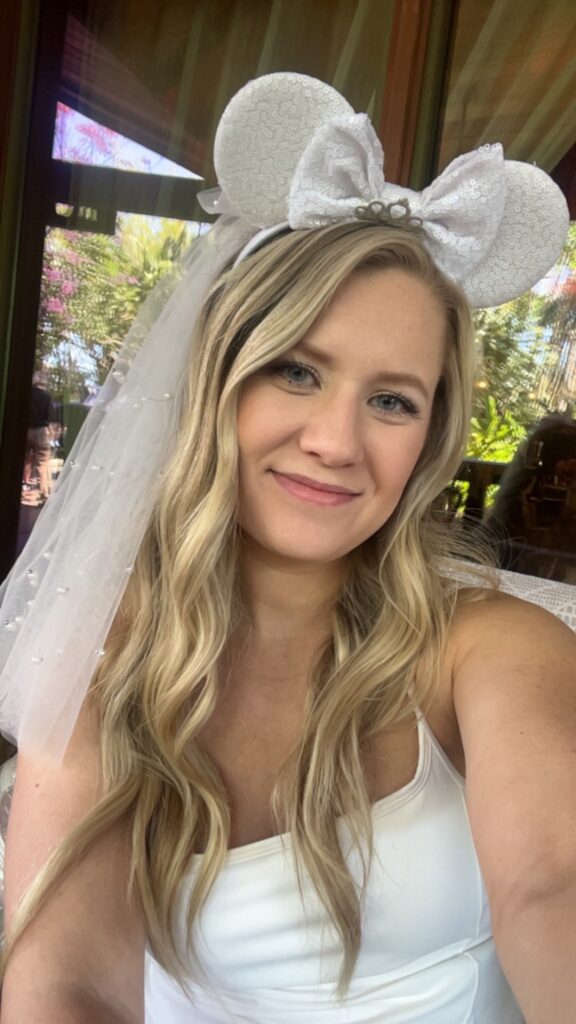 wedding photographer wearing disney ears