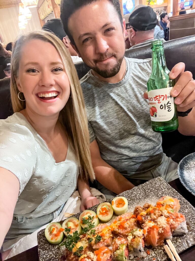 couple eating sushi on a date