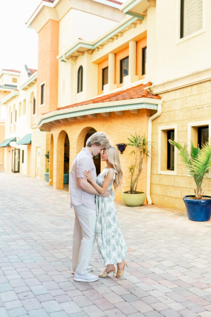 couple's engagement photos at cape harbour marina cape coral fl