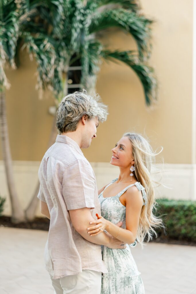 couple looking at each other at cape harbour marina cape coral fl