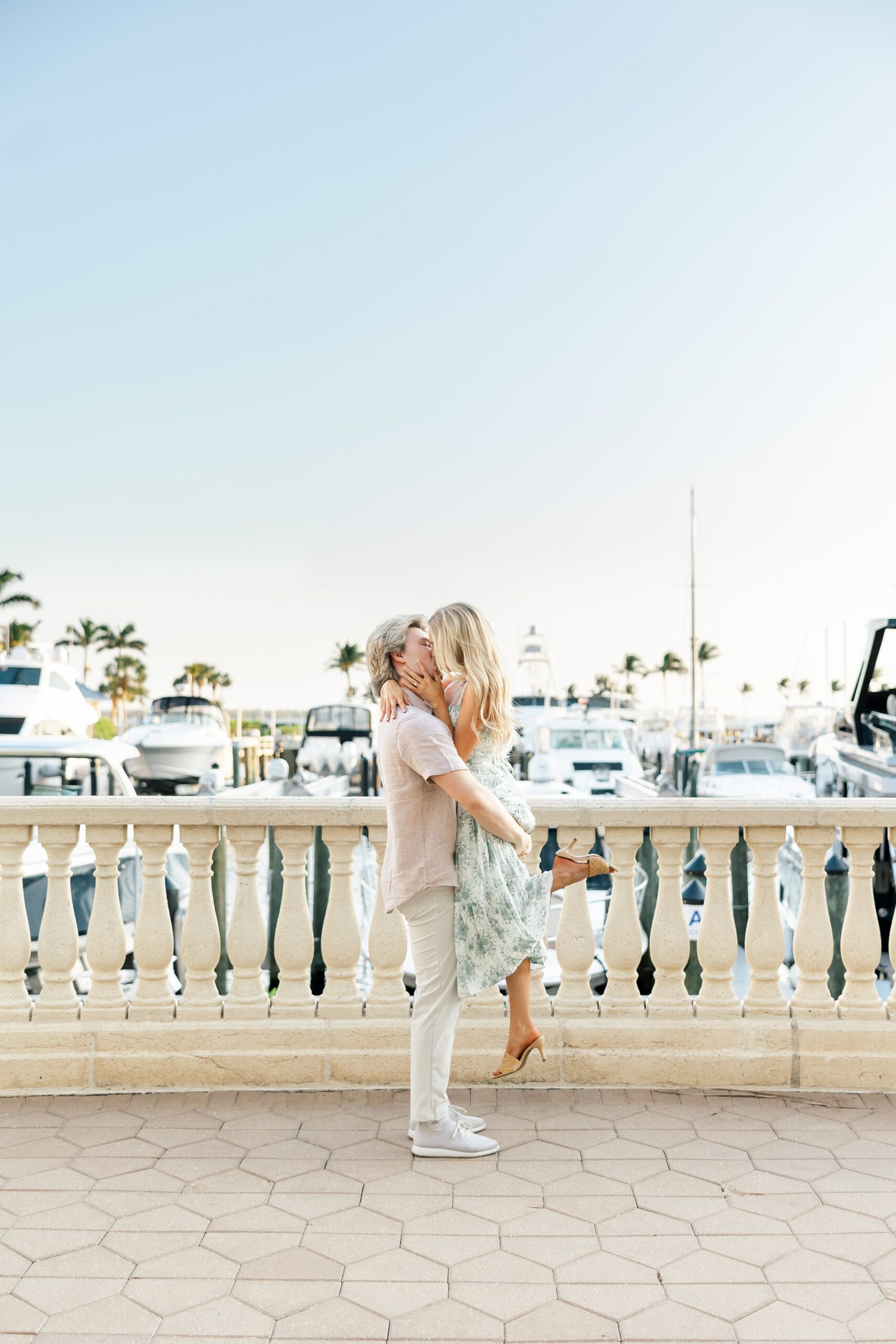 couple kissing for engagement photos at cape harbour