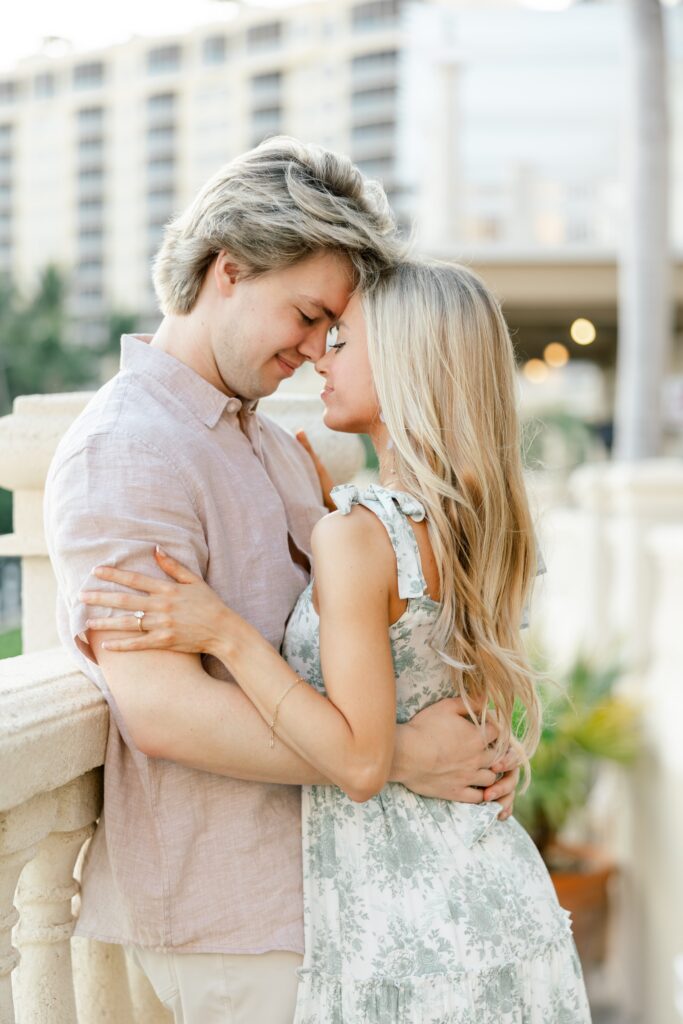 couple leaning against each other at cape harbour cape coral