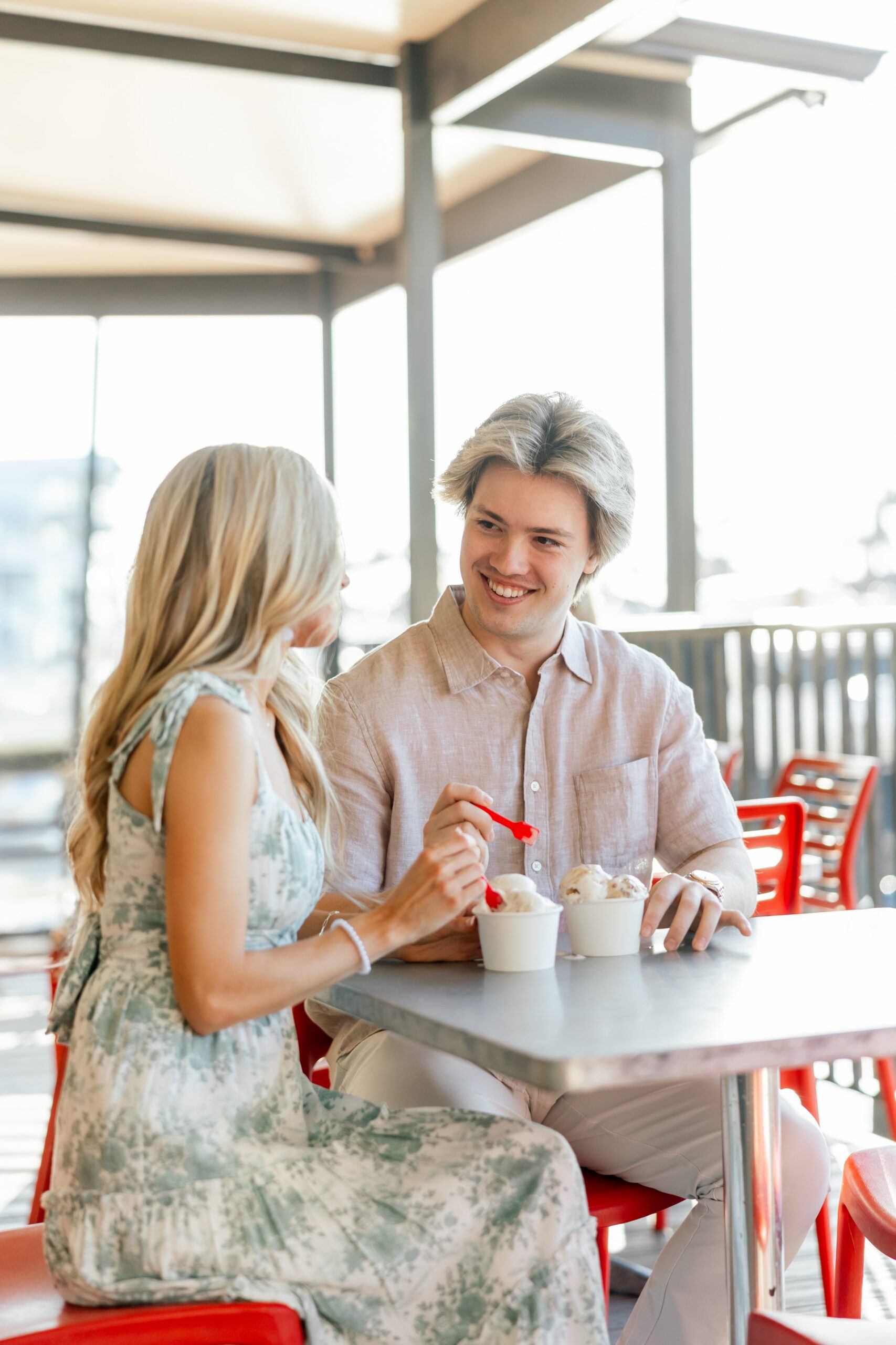 couple looking at each other and eating ice cream at Cape Harbour