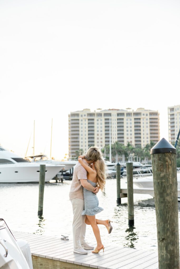 couple embracing on dock at cape harbour cape coral fl