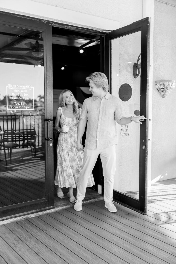 couple walking out of ice cream shop to show Cape Harbour Photos